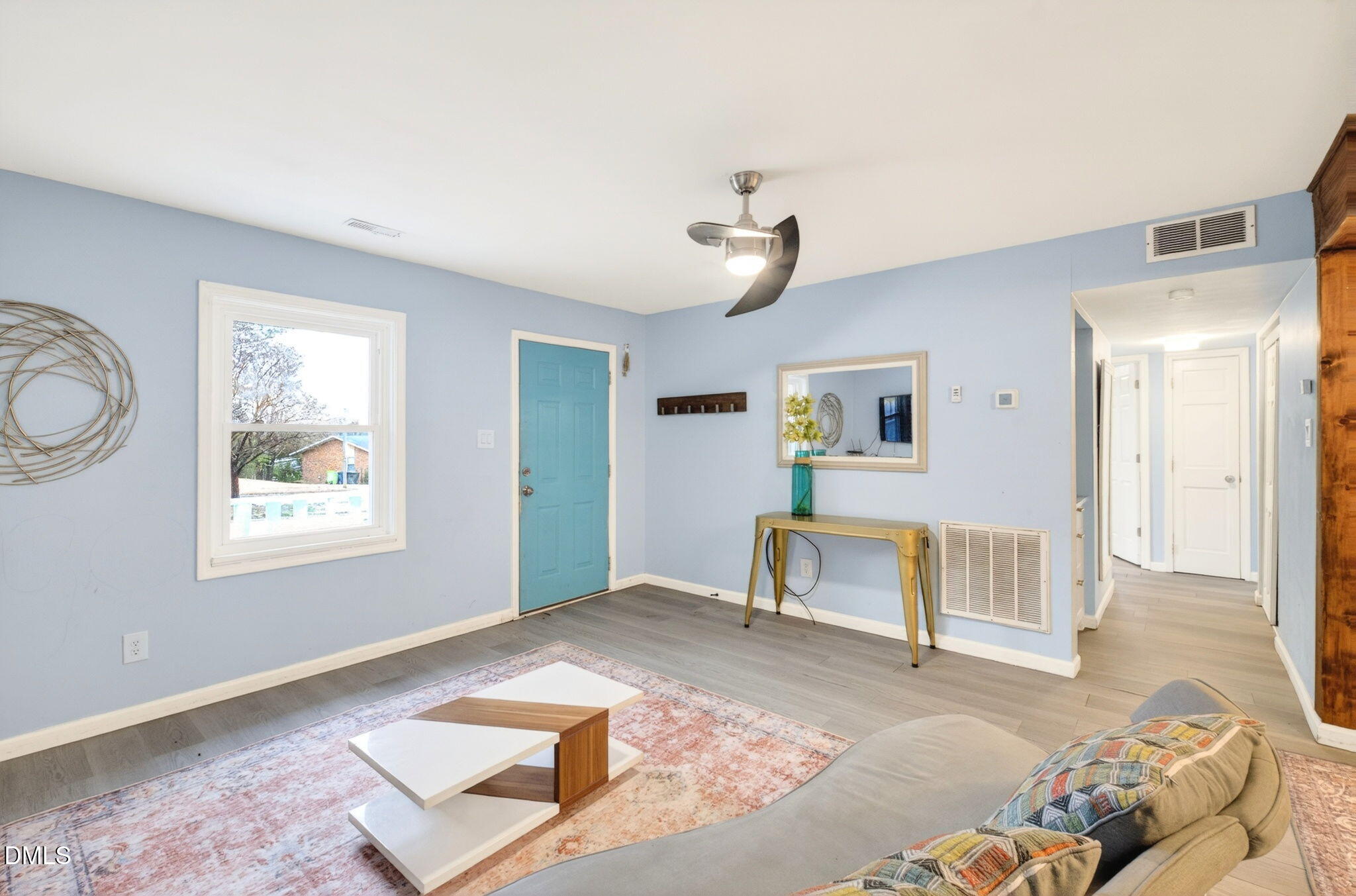 1809 Martin Luther King Jr Boulevard Raleigh, NC 27610 - Photo 4 of 26 a bedroom with furniture and a window