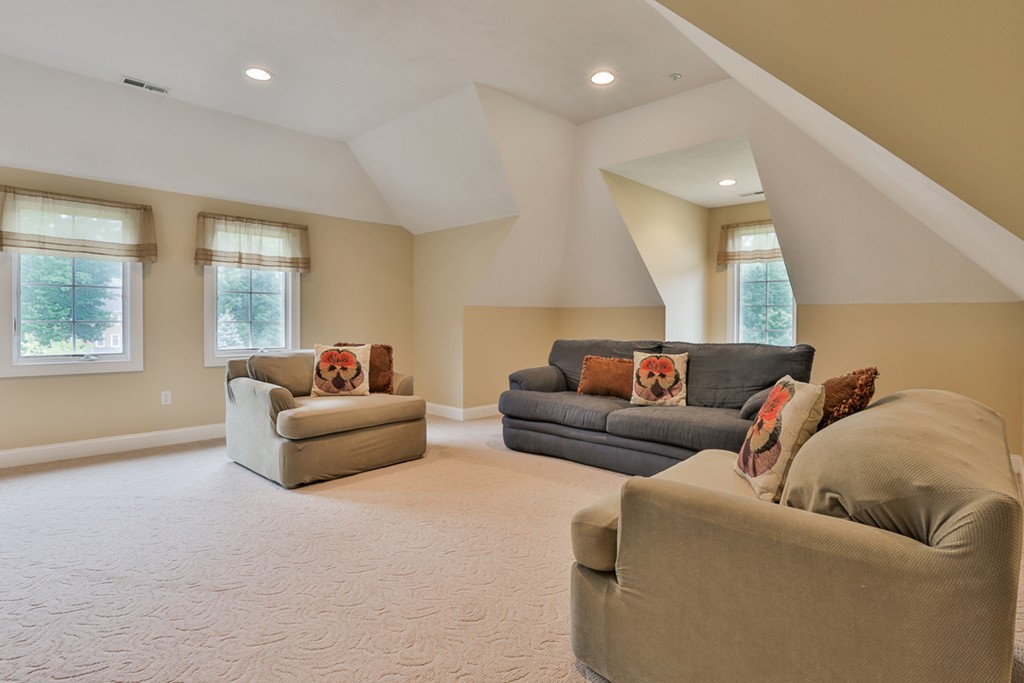 34 Sawmill Ridge Road Haverhill, MA 01832 - Photo 20 of 30 a living room with furniture and a window