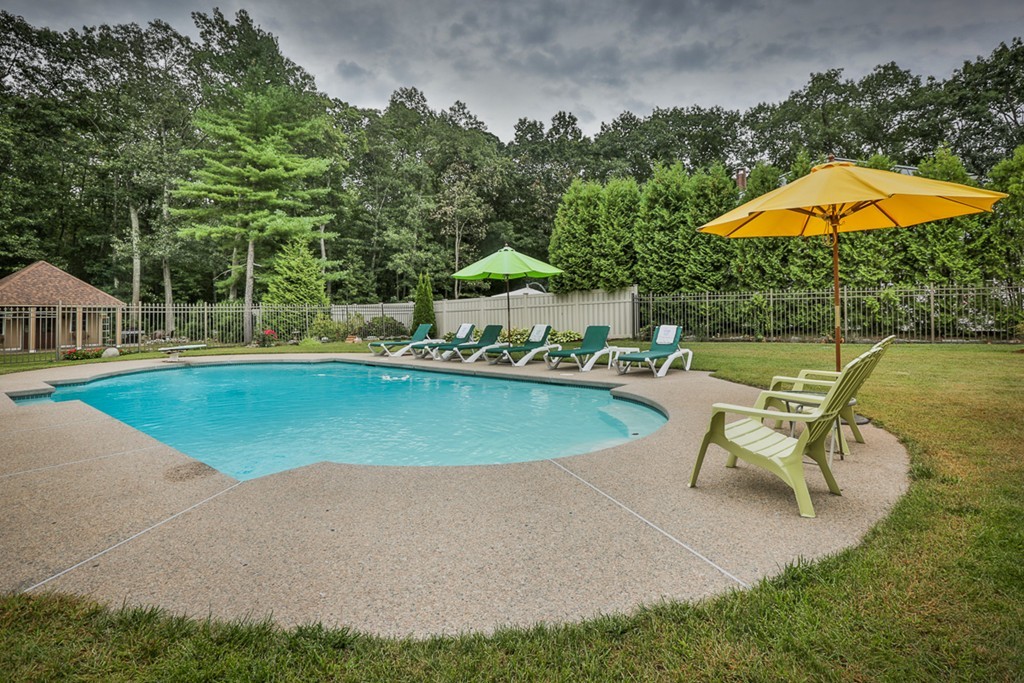 34 Sawmill Ridge Road Haverhill, MA 01832 - Photo 24 of 30 a view of a swimming pool and lounge chairs