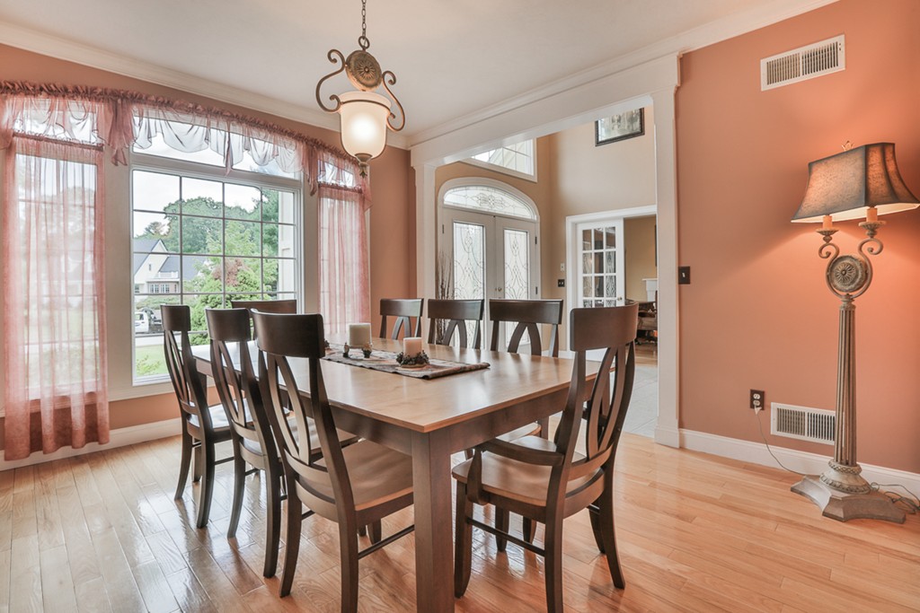 34 Sawmill Ridge Road Haverhill, MA 01832 - Photo 10 of 30 a view of a dining room with furniture window and wooden floor