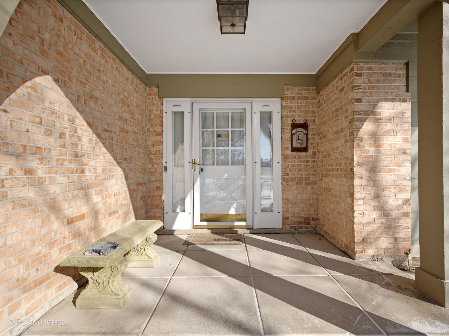 116 Rivershire Lane Lincolnshire, IL 60069 - Photo 2 of 27 a living room with a couch and a table