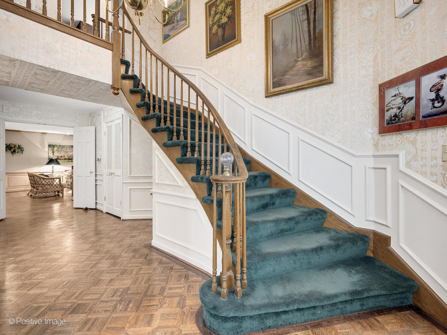 116 Rivershire Lane Lincolnshire, IL 60069 - Photo 4 of 27 a view of entryway and hall with wooden floor