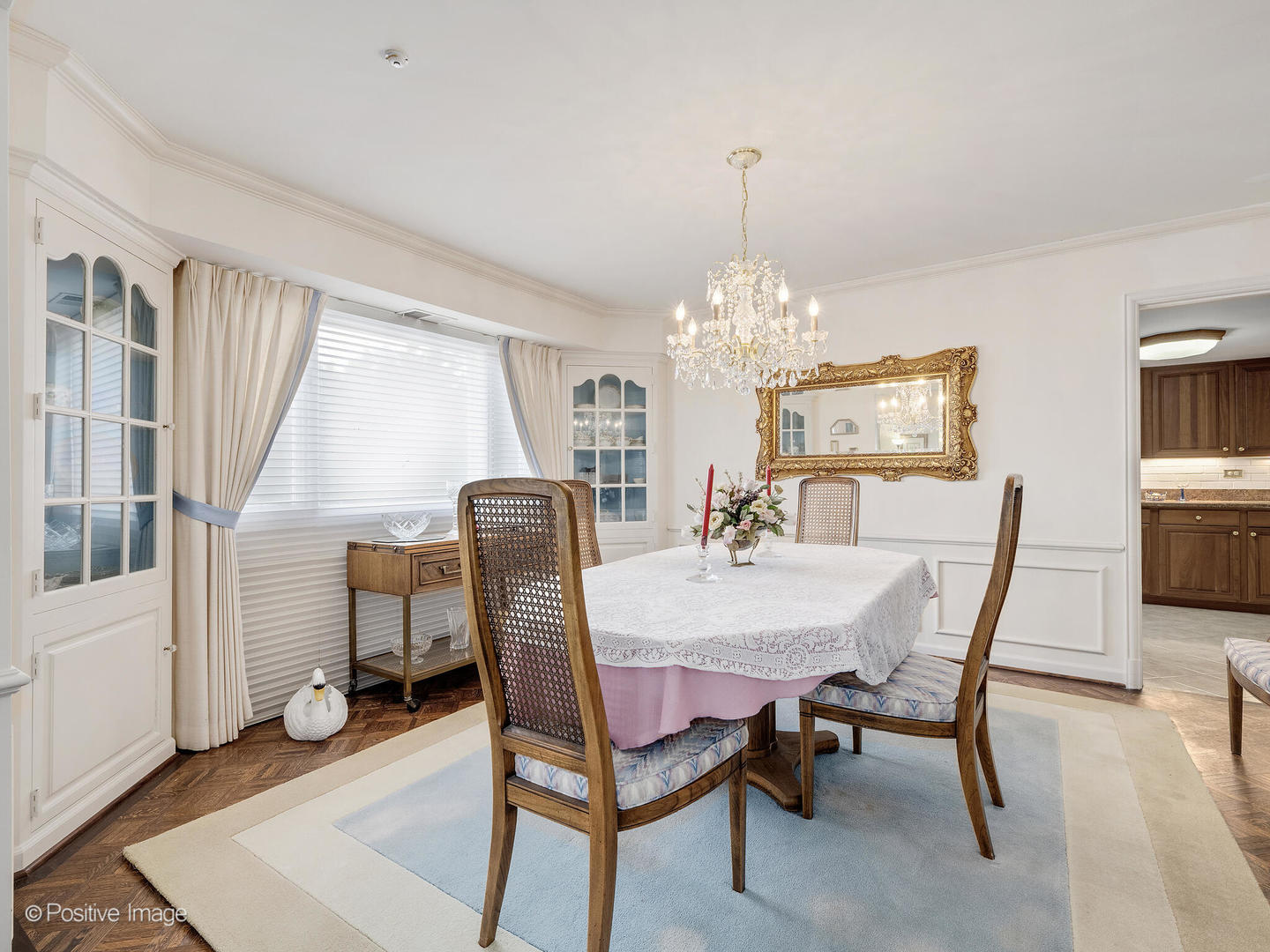 116 Rivershire Lane Lincolnshire, IL 60069 - Photo 7 of 27 a view of a dining room with furniture window and wooden floor