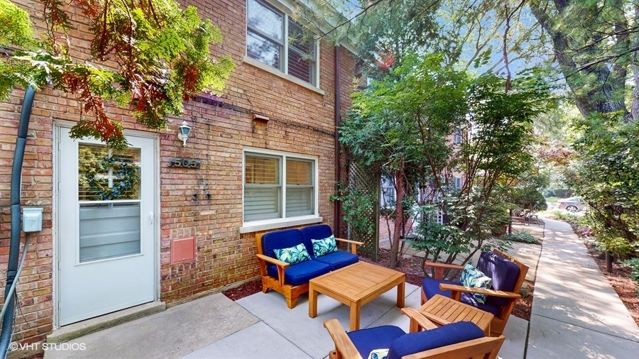 505 3rd Street Wilmette, IL 60091 - Photo 24 of 30 a backyard of a house with outdoor seating