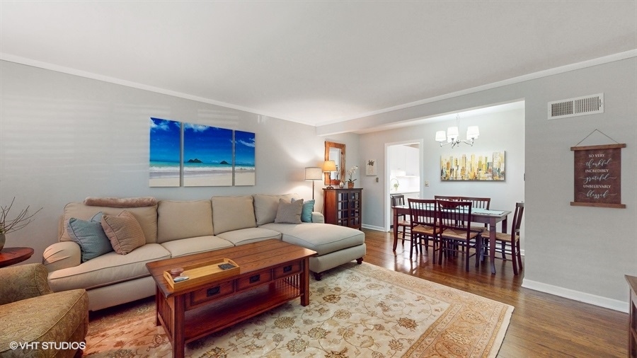 505 3rd Street Wilmette, IL 60091 - Photo 3 of 30 a living room with furniture a wooden floor and next to dining room