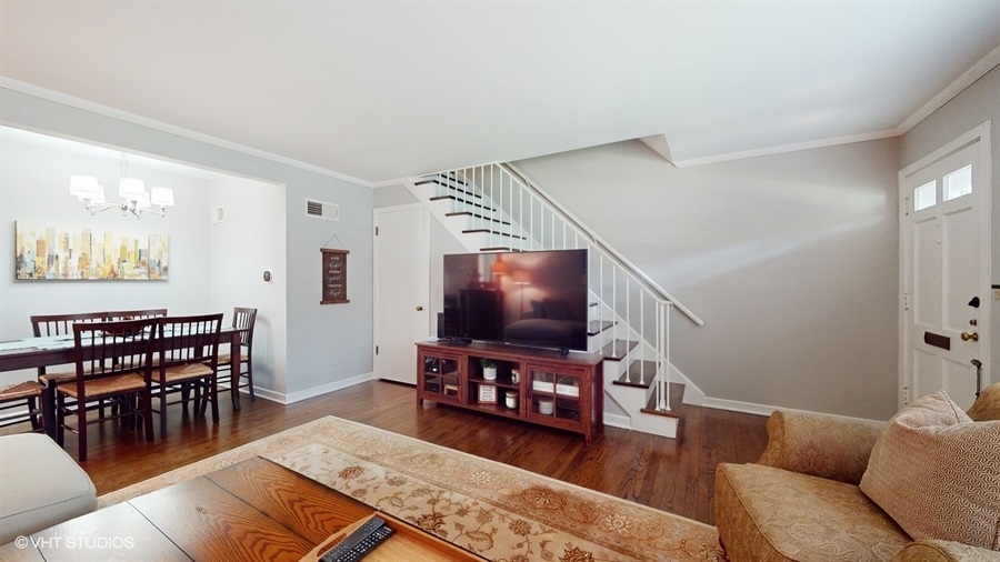 505 3rd Street Wilmette, IL 60091 - Photo 6 of 30 a living room with furniture and wooden floor