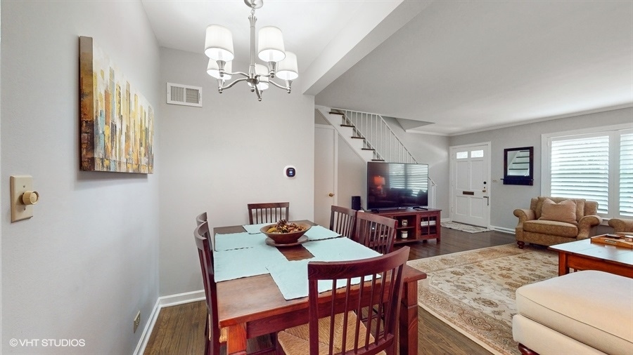 505 3rd Street Wilmette, IL 60091 - Photo 8 of 30 a view of a dining room with furniture and chandelier