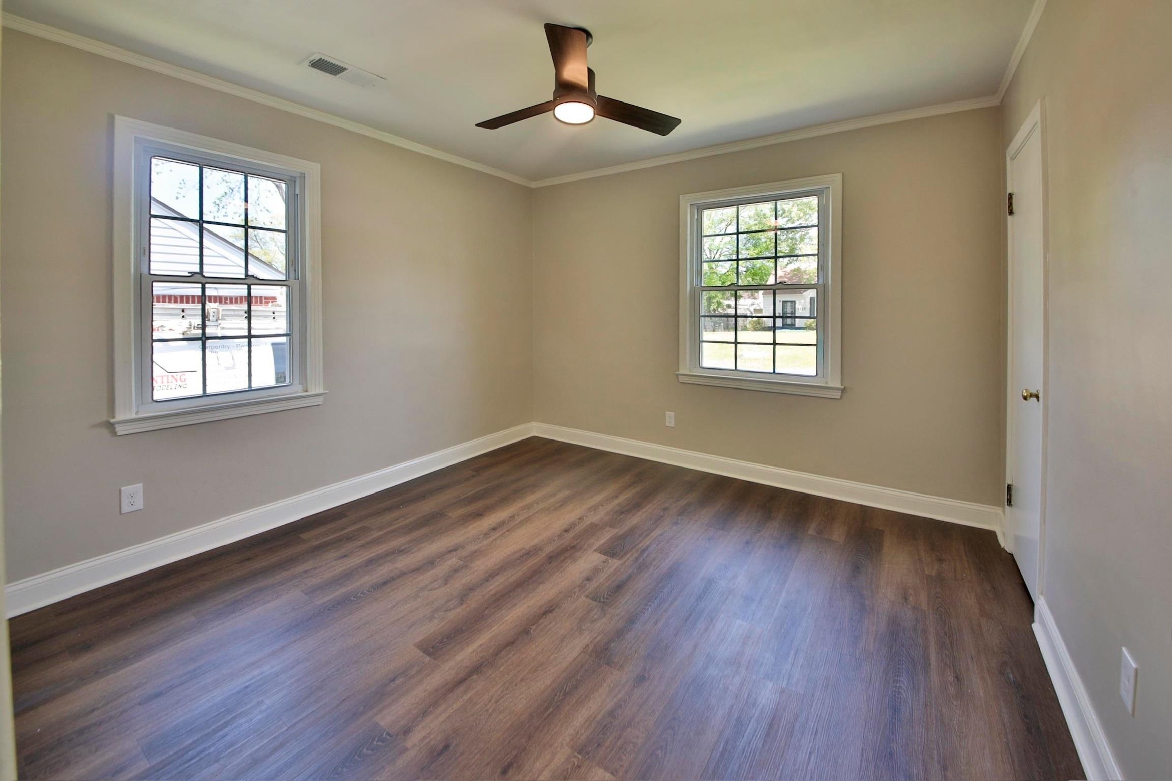 4869 Southern Road Memphis, TN 38117 - Photo 26 of 35 wooden floor in an empty room with a window