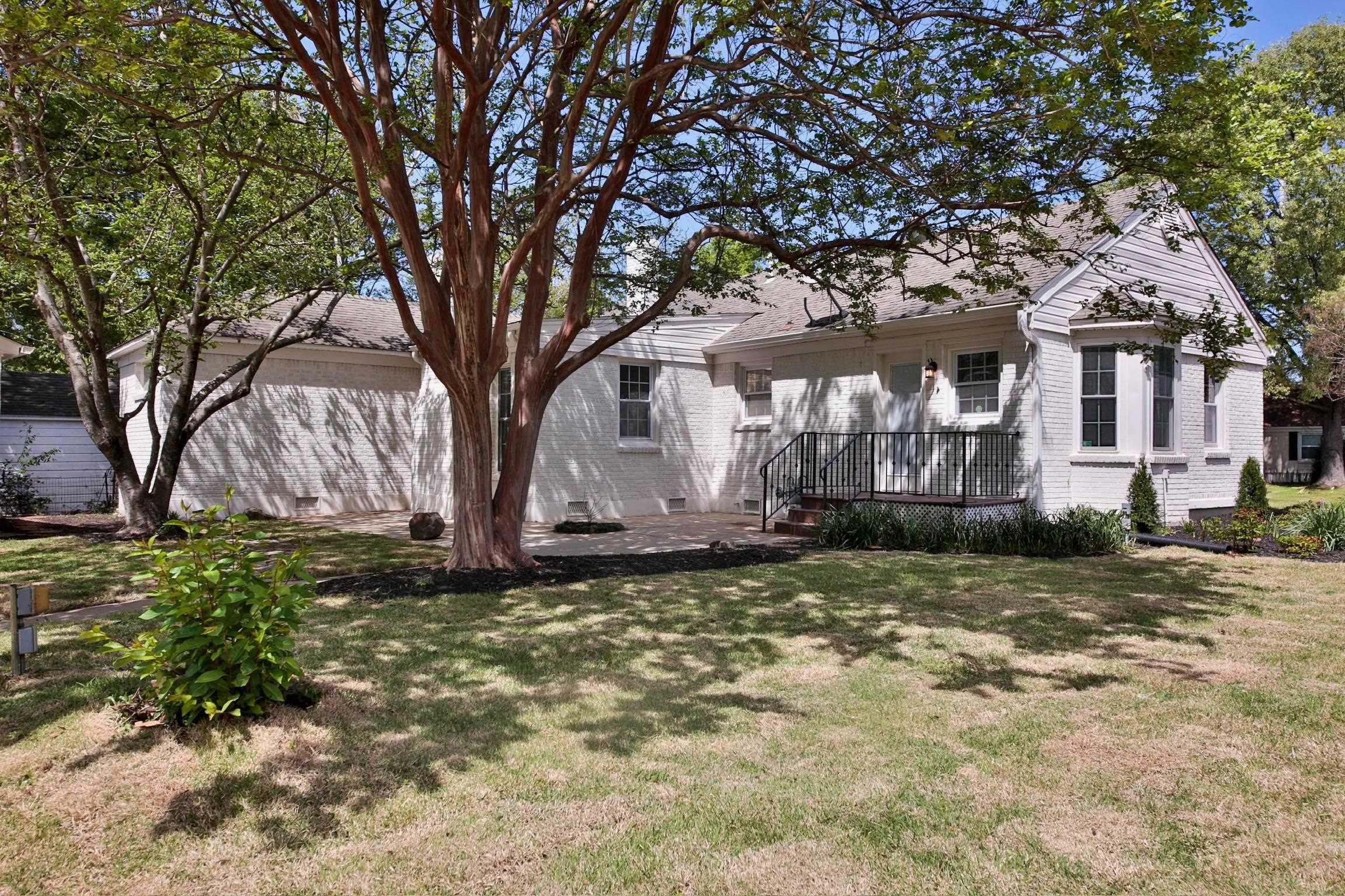 4869 Southern Road Memphis, TN 38117 - Photo 35 of 35 a house is sitting in middle of forest