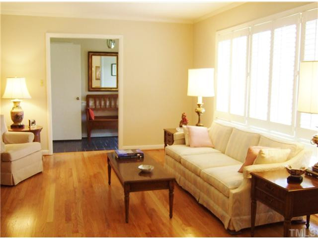 4225 Redington Drive Raleigh, NC 27609 - Photo 6 of 25 The spacious living room features gleaming hardwood floors. The hardwoods on the main level were refinished in 2014. Living Room