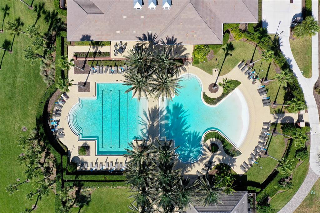 426 Long Cove Road Ormond Beach, FL 32174 - Photo 36 of 73 an aerial view of a swimming pool with outdoor seating and yard