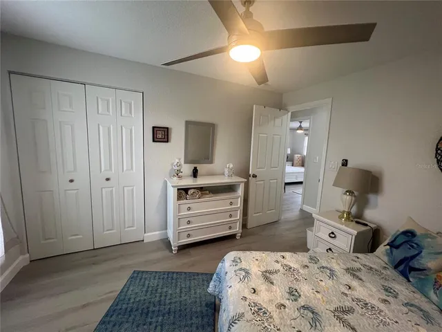 a bedroom with a bed and furniture