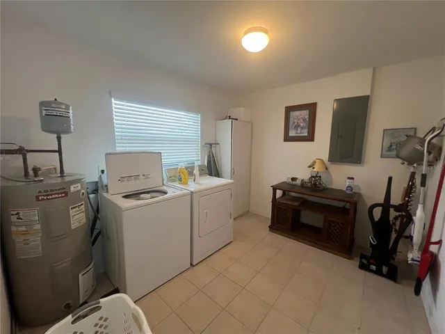 a room with a bed and a desk