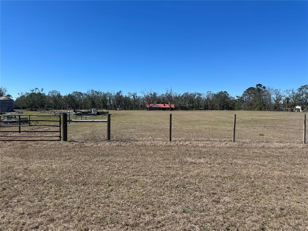 13220 225th Road Live Oak, FL 32060 - Photo 24 of 31 a view of outdoor space and mountain view