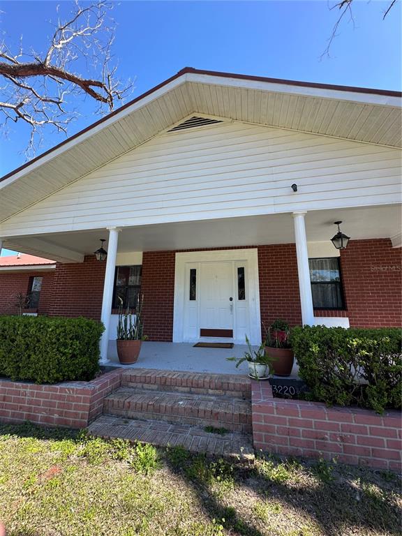 13220 225th Road Live Oak, FL 32060 - Photo 3 of 31 a front view of house with yard