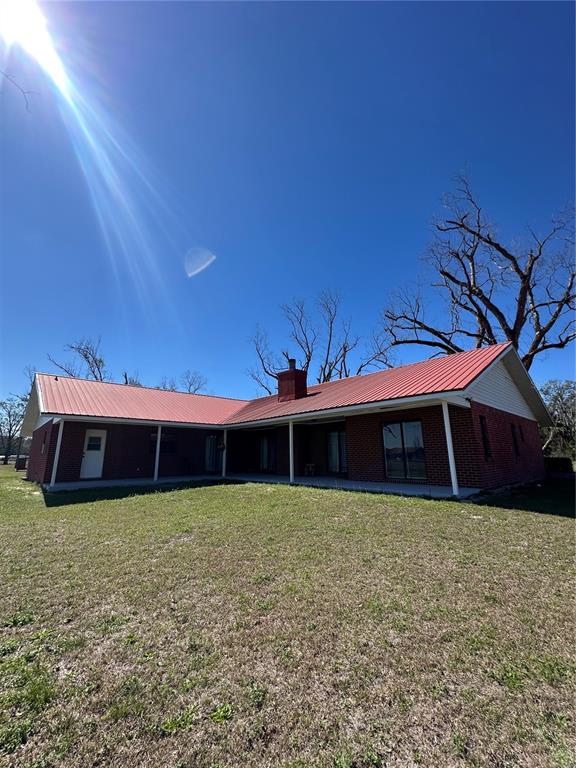 13220 225th Road Live Oak, FL 32060 - Photo 6 of 31 a view of a house with a yard