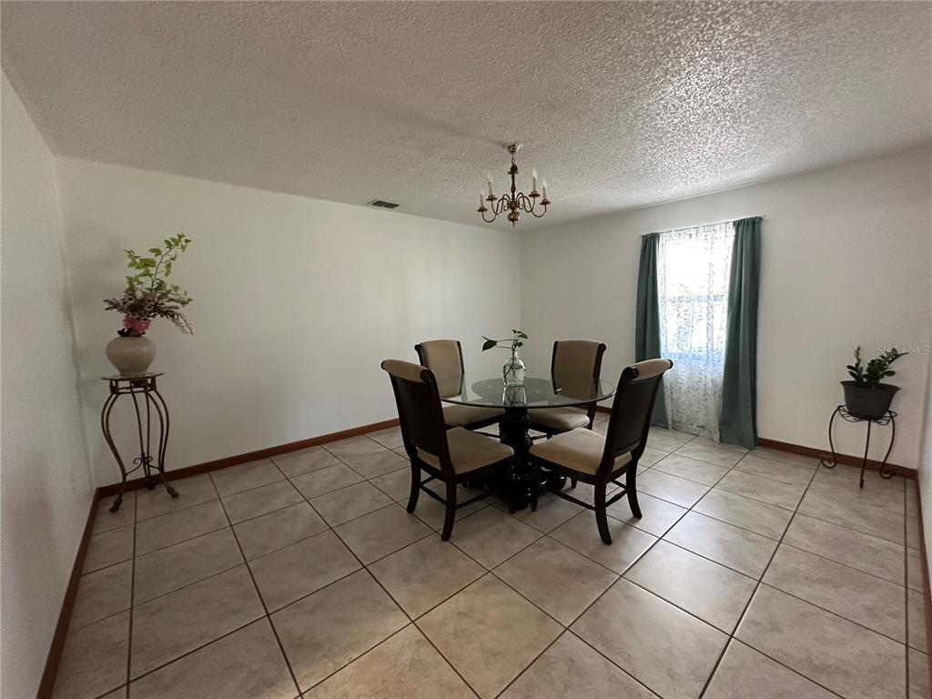 13220 225th Road Live Oak, FL 32060 - Photo 9 of 31 a view of a dining room with furniture