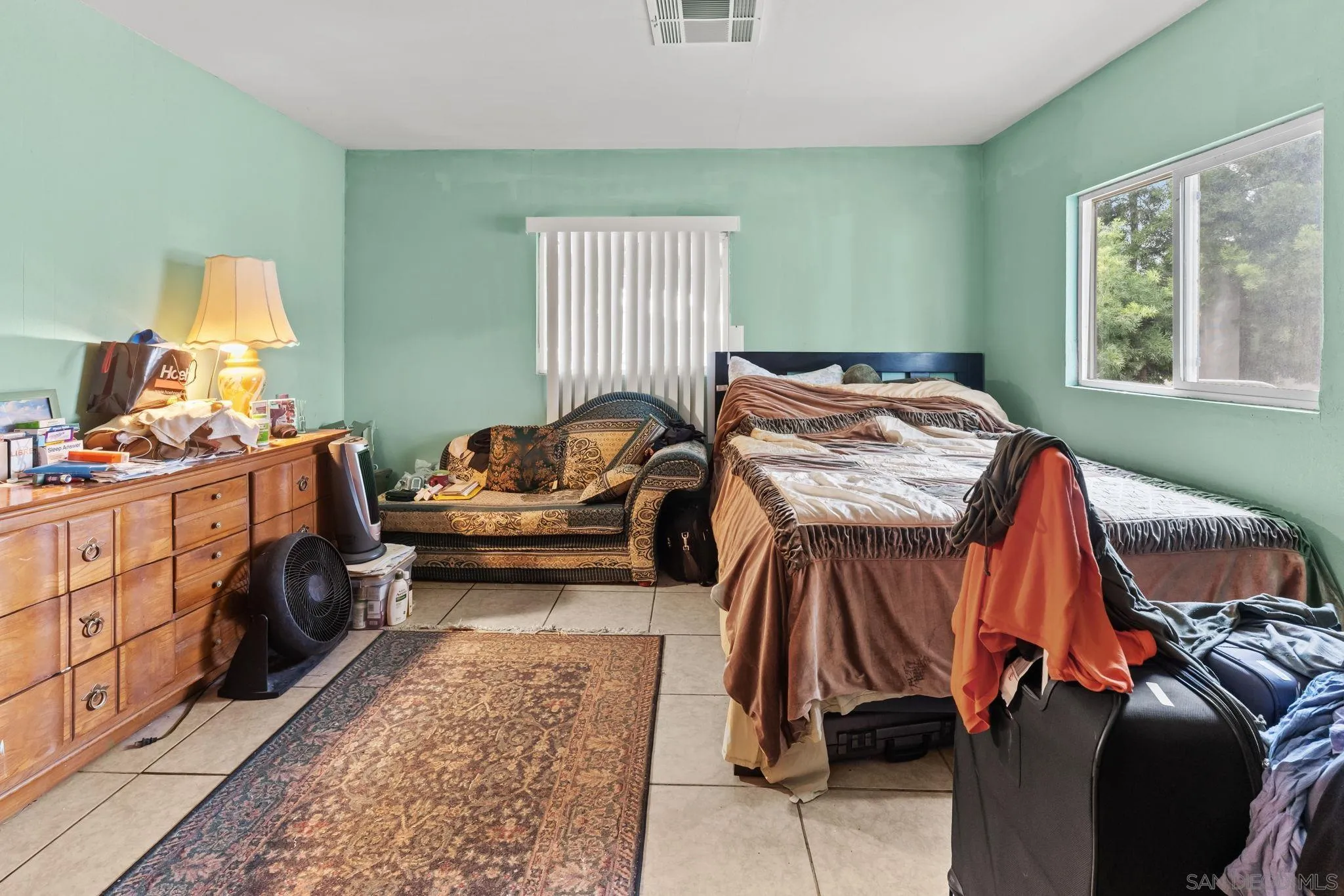 30100 Valley Center Road Valley Center, CA 92082 - Photo 14 of 20 a bedroom with a bed and window