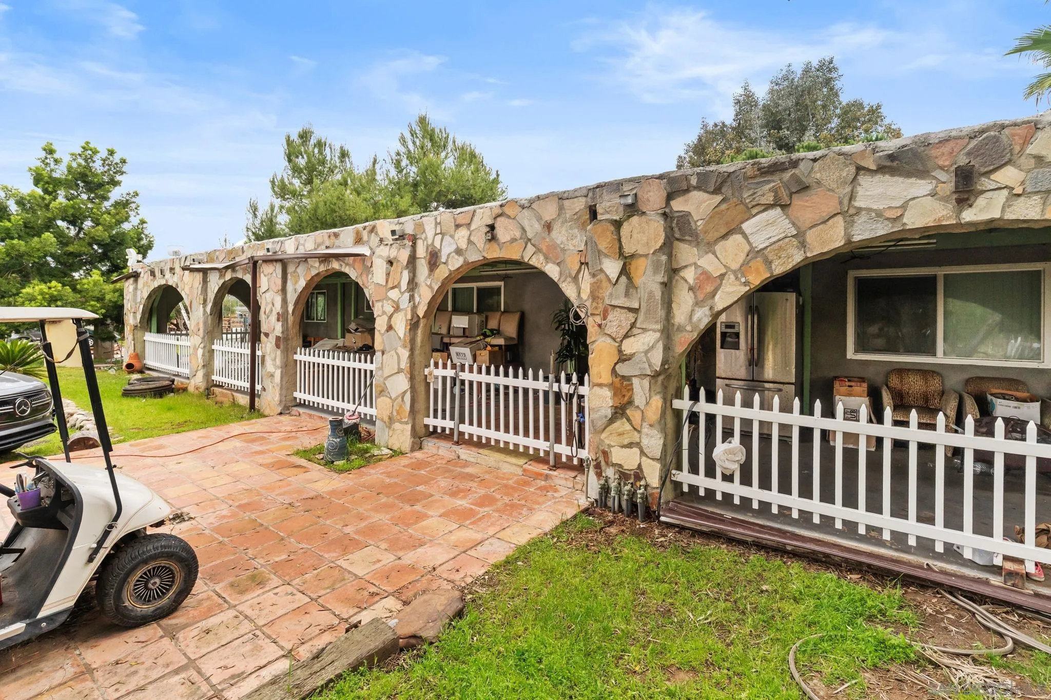 30100 Valley Center Road Valley Center, CA 92082 - Photo 18 of 20 a view of a house with backyard and porch