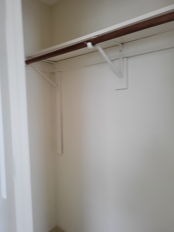 947 River Street, Unit 3 Boston, MA 02136 - Photo 8 of 8 a view of a rack