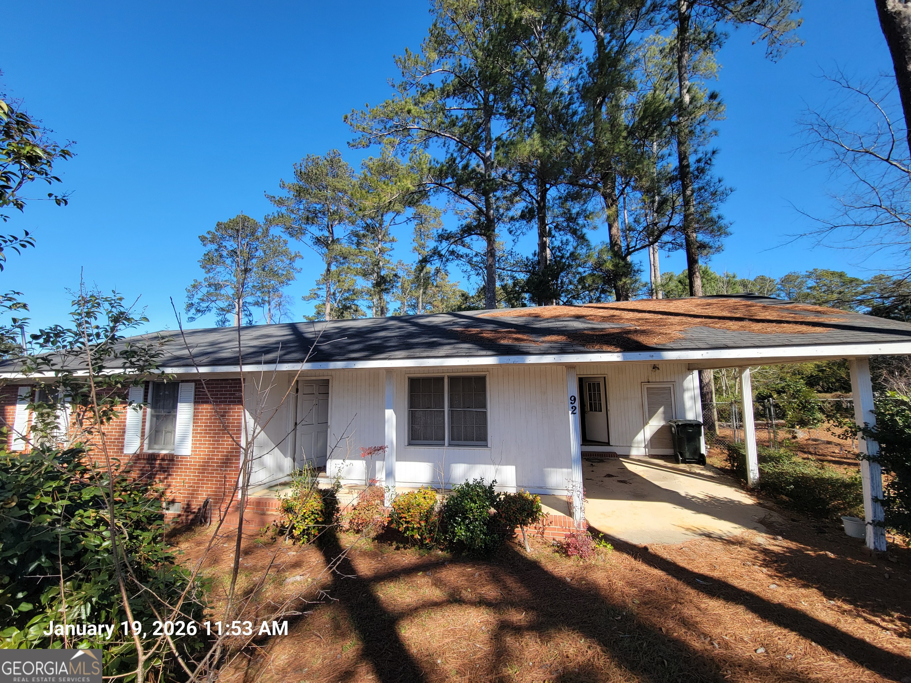 92 Mathews Street Fort Valley, GA 31030 - Photo 1 of 8 a front view of a house with a yard