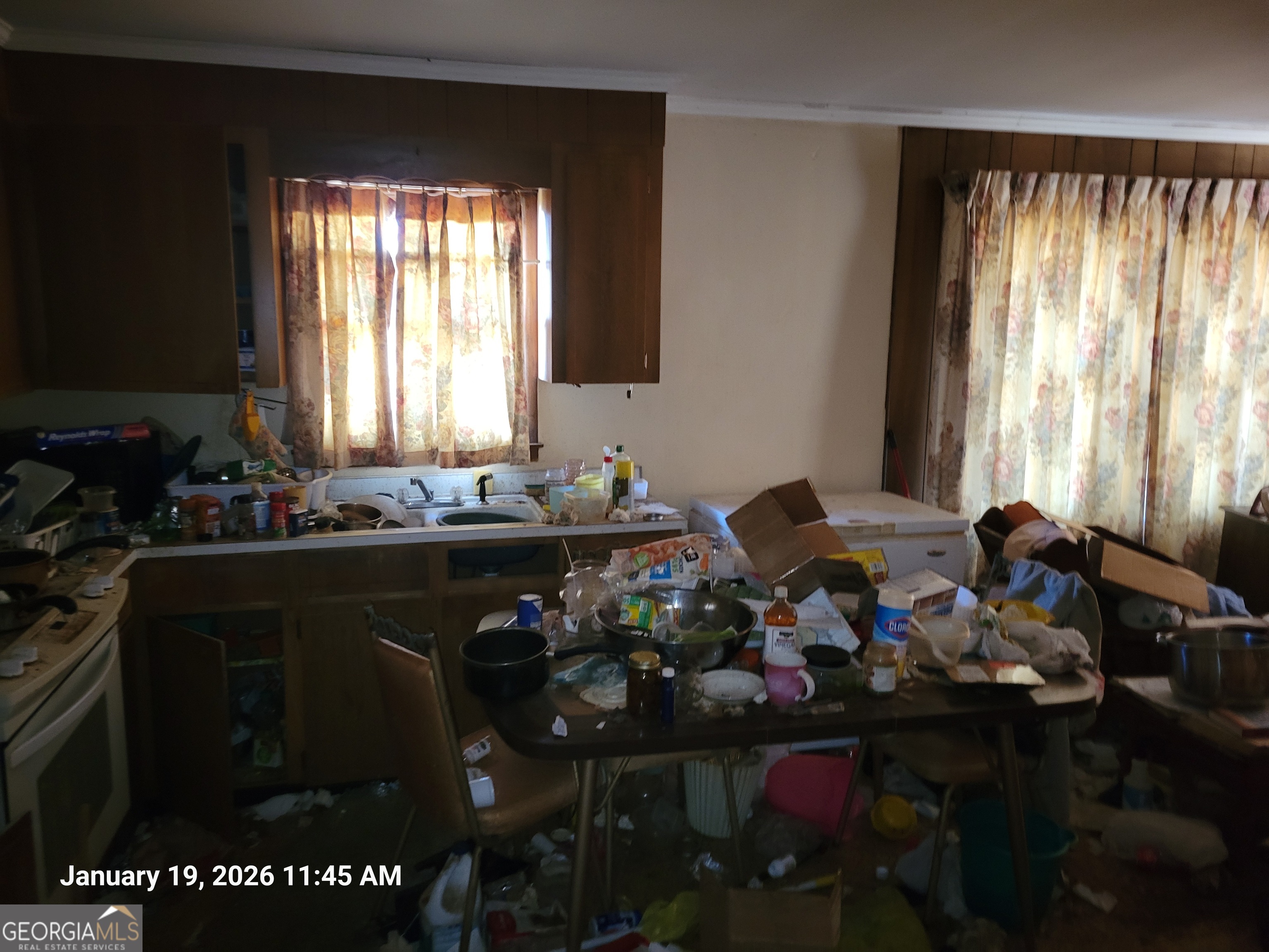 92 Mathews Street Fort Valley, GA 31030 - Photo 4 of 8 a living room with a large window