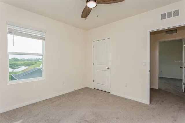 a front view of a house with a yard and porch