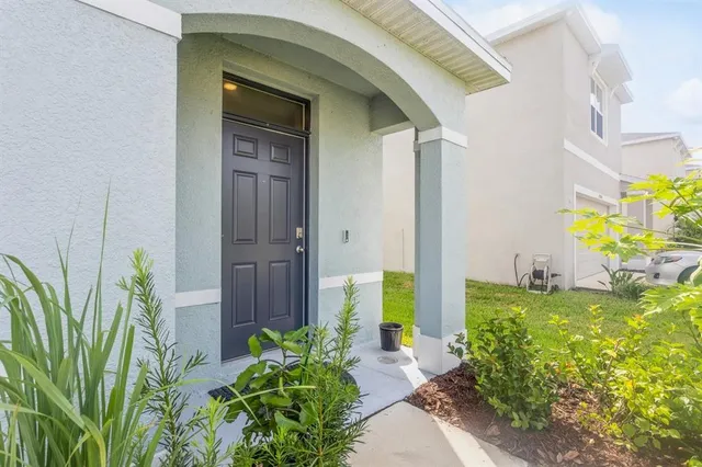 a view of swimming pool from a yard