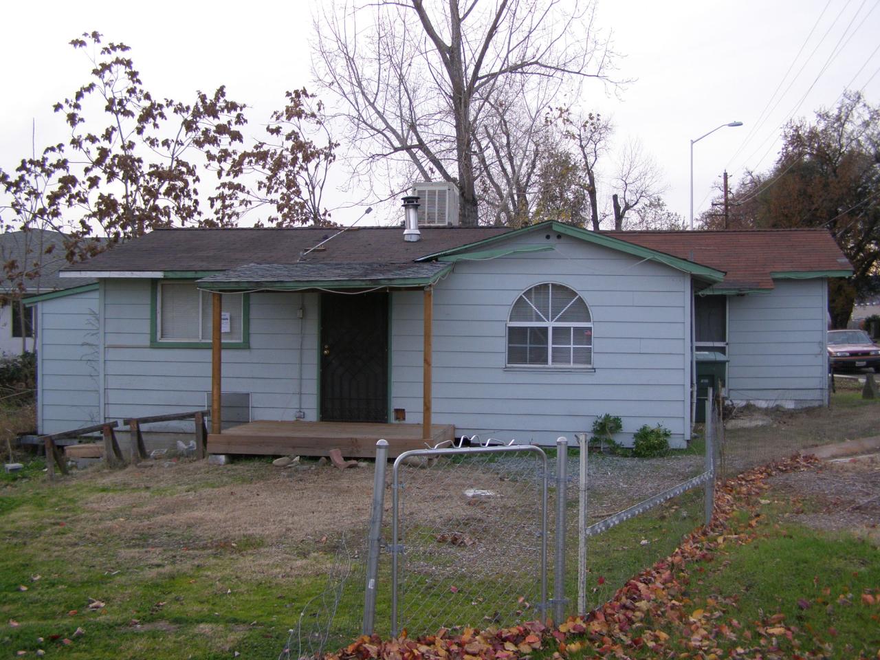 2521 Girvan Road Redding, CA 96001 - Photo 3 of 4 a front view of a house with garden