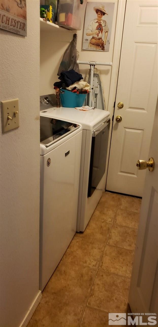 1400 Lattin Road Fallon, NV 89406 - Photo 4 of 10 a utility room with dryer and washer