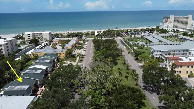 a view of a park with swings