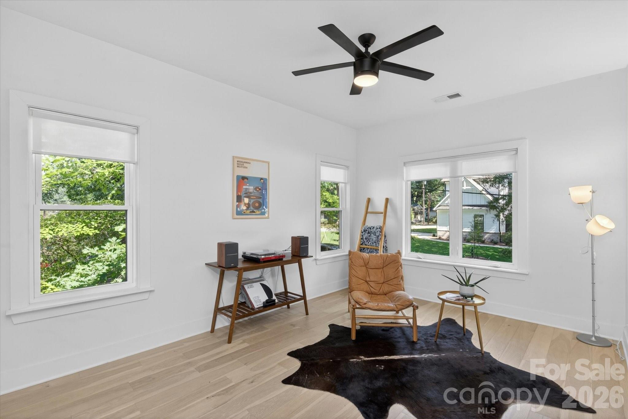 1608 Chippendale Road Charlotte, NC 28205 - Photo 40 of 46 a living room with furniture and a large window