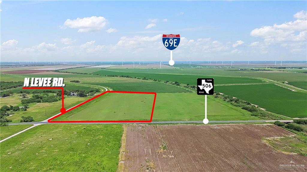 Expansive land parcel with clear boundaries, bordering N Levee Road