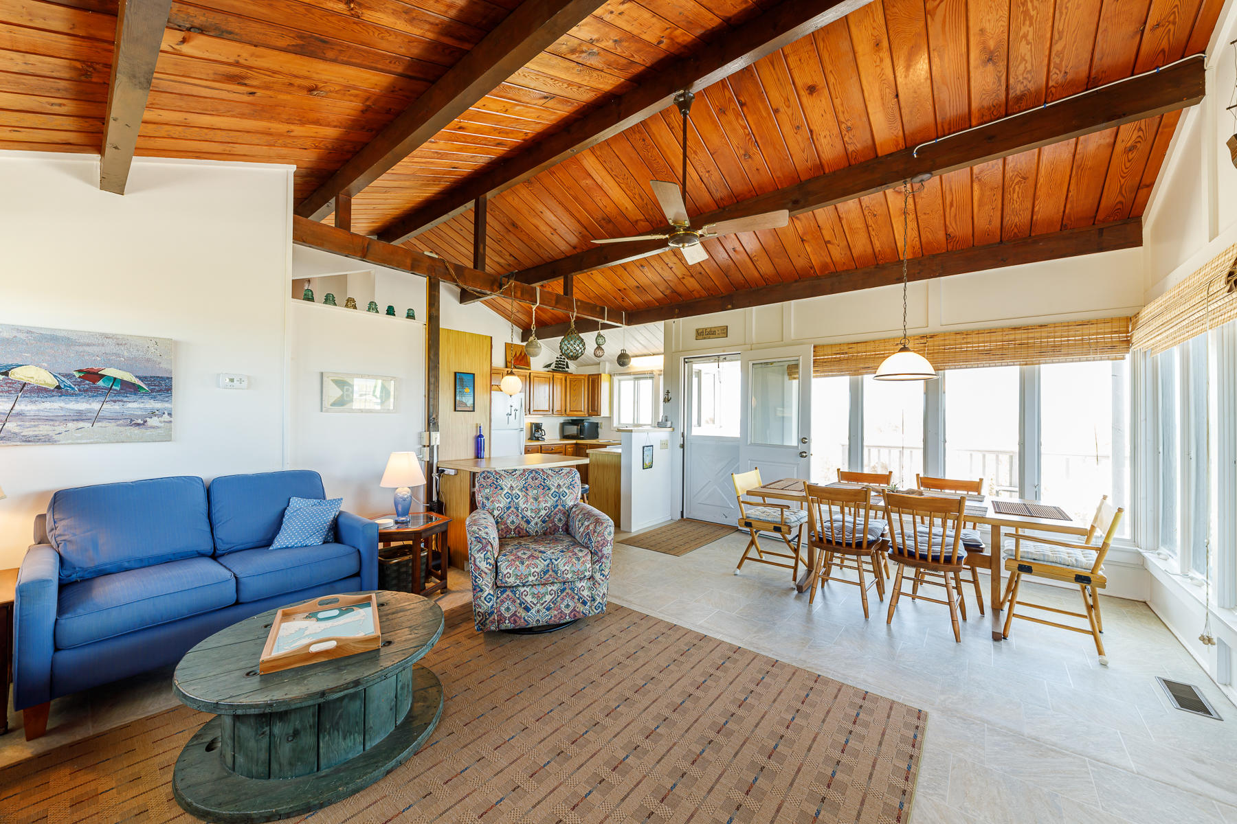 165 Harmes Way Eastham, MA 02642 - Photo 14 of 31 a living room with furniture a wooden floor and next to a window