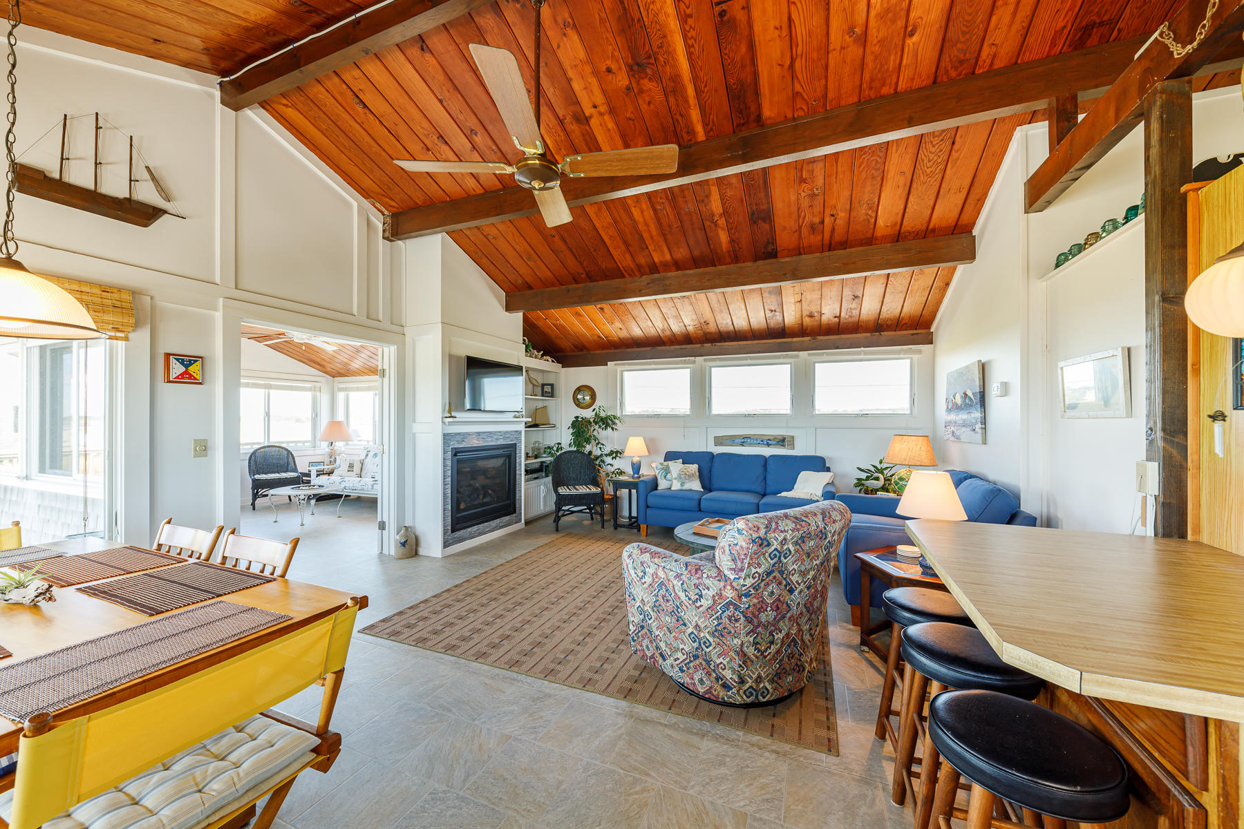 165 Harmes Way Eastham, MA 02642 - Photo 15 of 31 a view of a dining room with furniture window and outside view