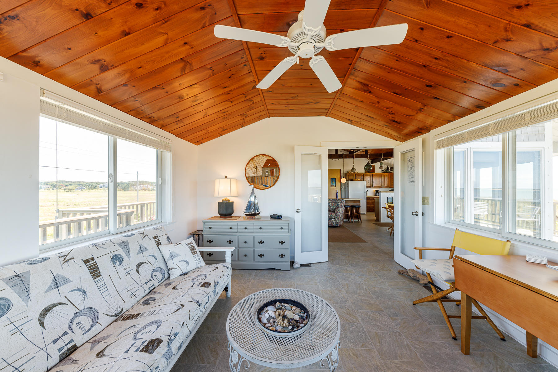 165 Harmes Way Eastham, MA 02642 - Photo 17 of 31 a living room with furniture and a large window