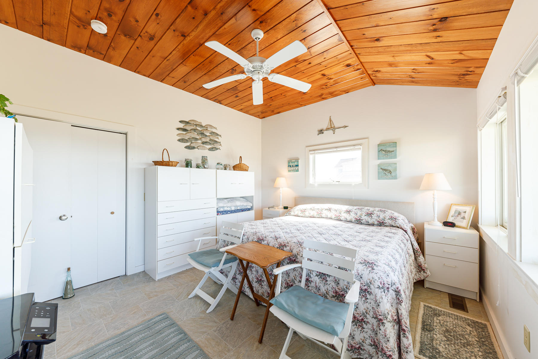 165 Harmes Way Eastham, MA 02642 - Photo 21 of 31 a dining room with a table and chairs