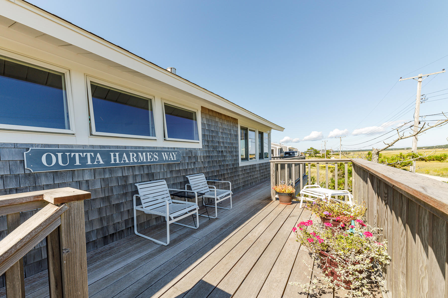 165 Harmes Way Eastham, MA 02642 - Photo 30 of 31 a view of a chairs and table on the balcony