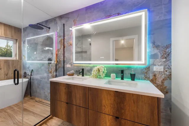 a bathroom with a sink and a mirror