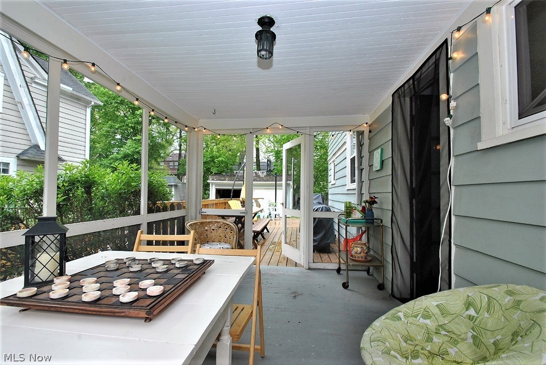 3334 Ingleside Road Shaker Heights, OH 44122 - Photo 11 of 35 Screened porch with beadboard ceiling leads to deck.