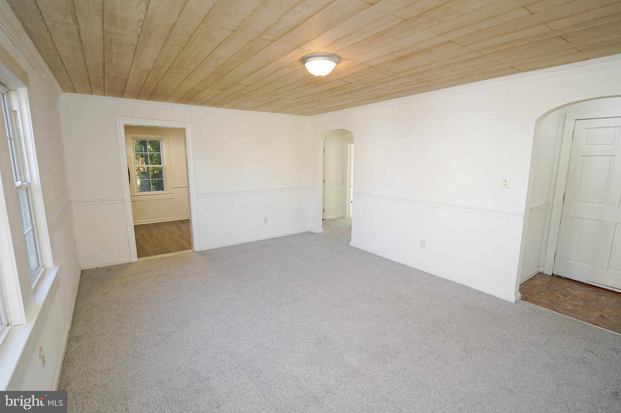 509 State Street Seaford, DE 19973 - Photo 11 of 31 an empty room with windows
