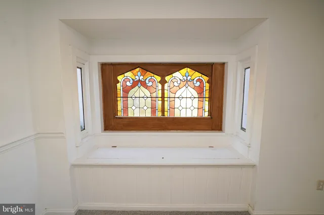 a kitchen with a stove microwave and sink