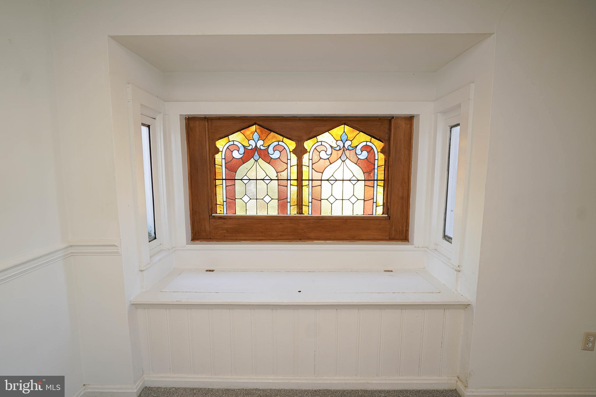 509 State Street Seaford, DE 19973 - Photo 12 of 31 a bathroom with a bathtub and a window