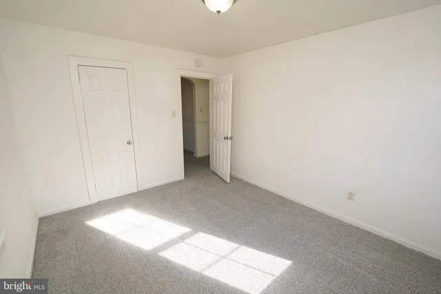 a view of empty room with windows