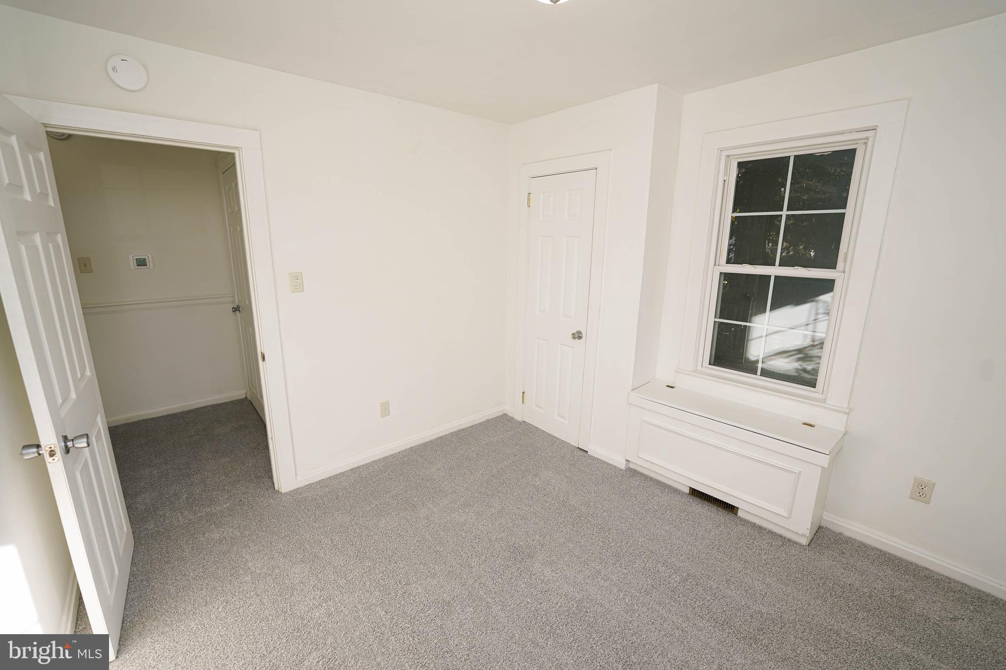 509 State Street Seaford, DE 19973 - Photo 27 of 31 an empty room with windows