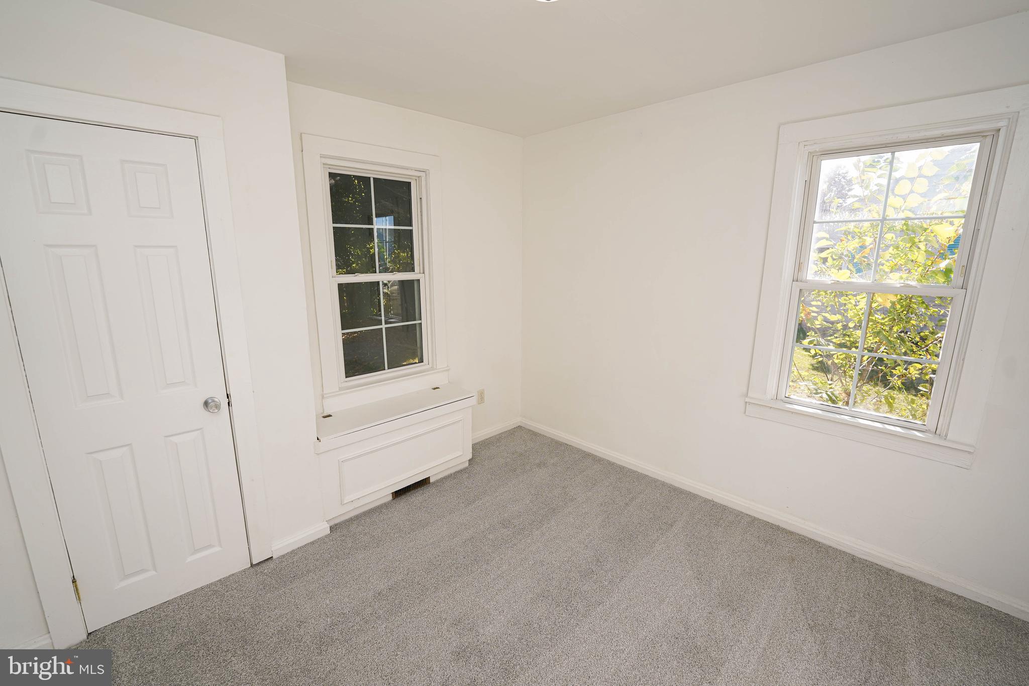 509 State Street Seaford, DE 19973 - Photo 30 of 31 an empty room with windows and closet