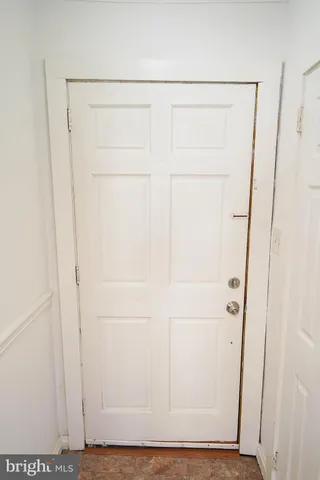 a view of small space with wooden floor