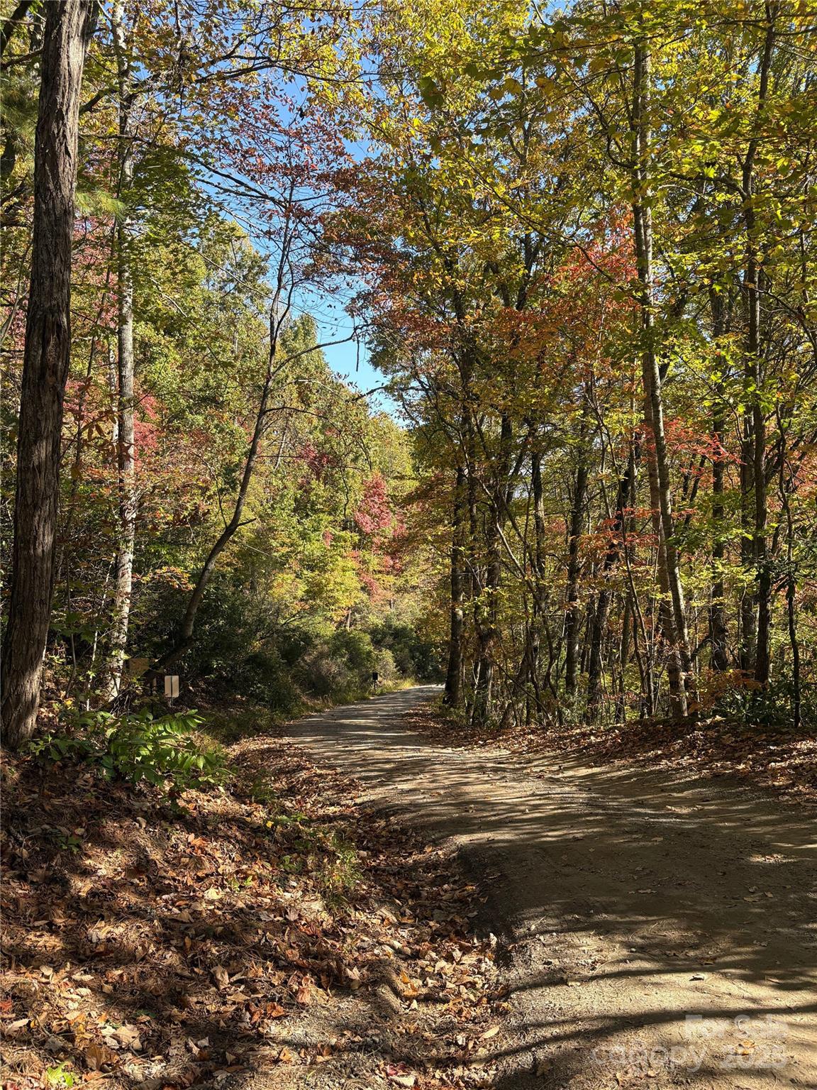 0 Mack Luke Road, Unit 6 Whittier, NC 28789 - Photo 17 of 23 a view of dirt yard with a building