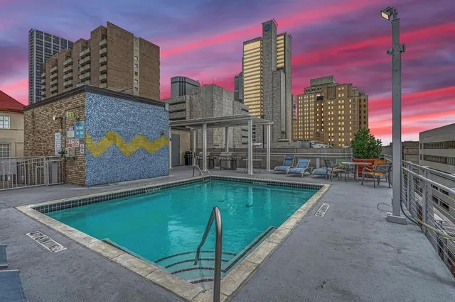 a view of a city with tall buildings