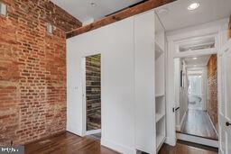 1112 3rd Street Northeast Washington, DC 20002 - Photo 11 of 16 a view of hallway with stairs and wooden floor